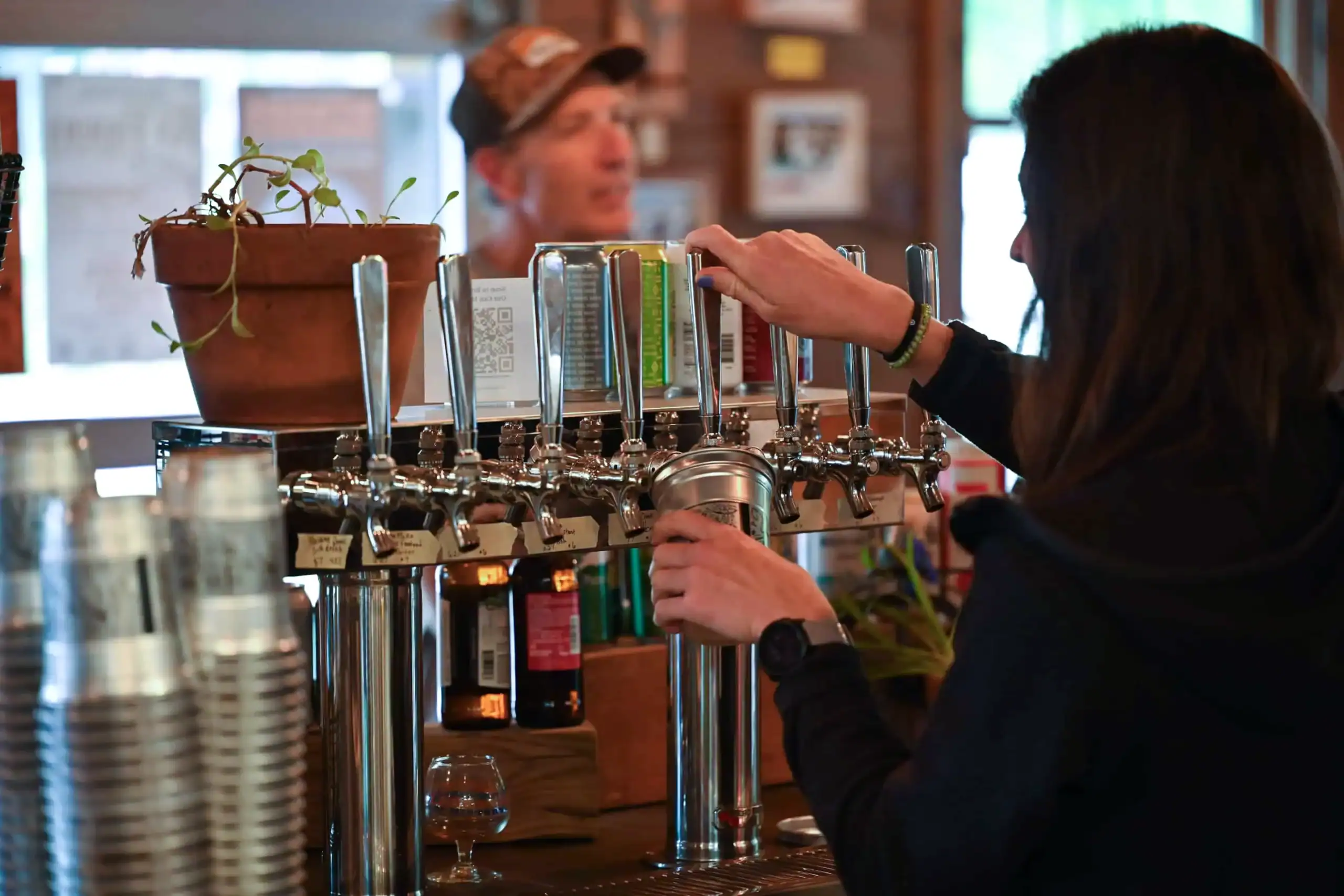 women pouring beer at the Pisgah Tavern in Brevard